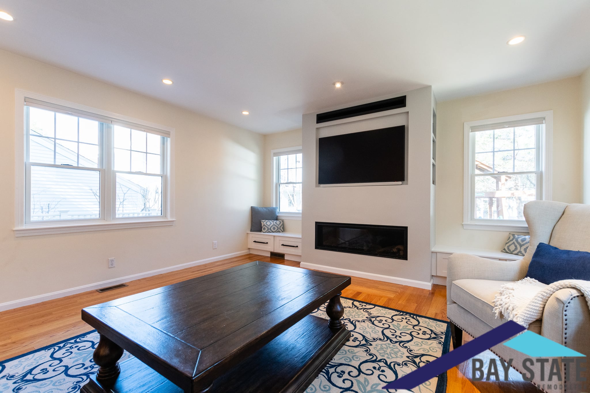 reviewing a written contract and project scope document with a professional remodeling contractor